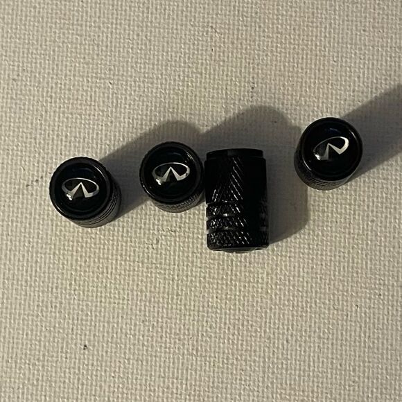 Infinity valve Stem caps in black set of 4 NWT - Picture 1 of 4